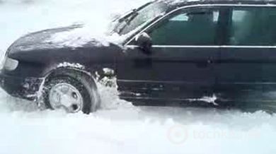 Audi A6 quattro в снежных сугробах