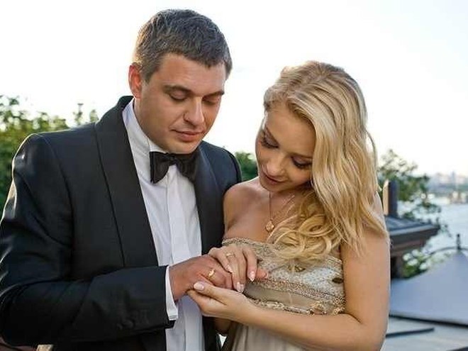 Евгений Огир, Тина Кароль