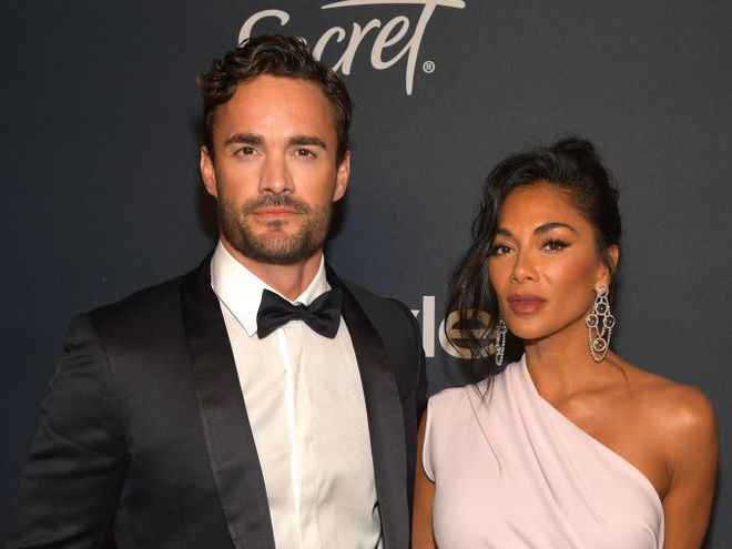 Том Еванс і Ніколь Шерзінгер