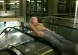 Girl spins on escalator