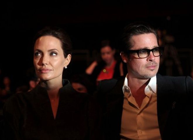 Джоли и Питт: жизнь звездной пары в фотографиях