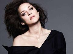 Беременная Марион Котийяр снялась для Elle