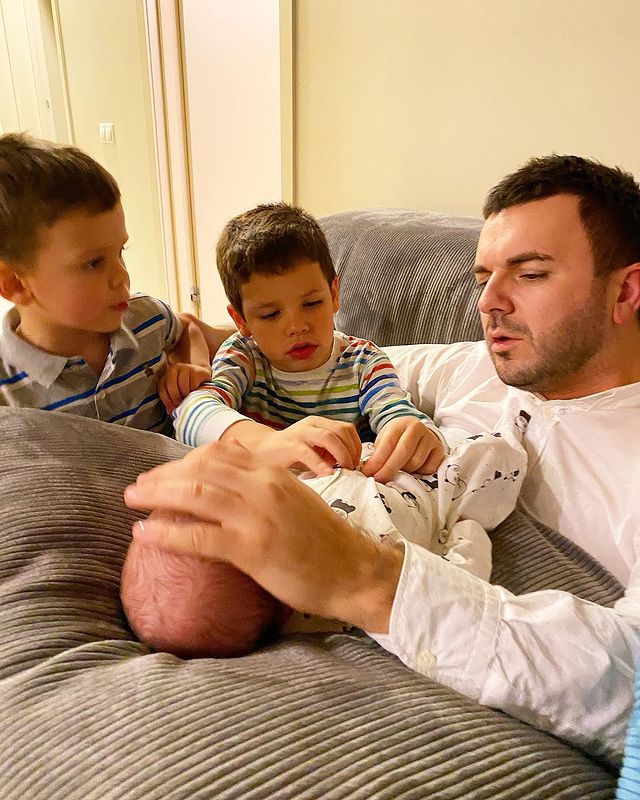 Григорий Решетник с тремя сыновьями