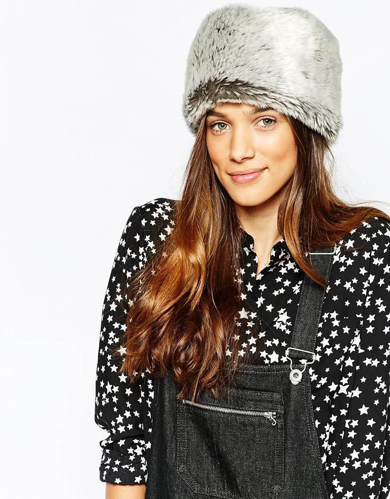 Меховые жилеты и шубы