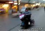 Fat old man does scooter stunts