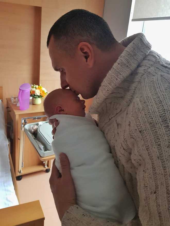 Олег Сенцов з донькою Еммою